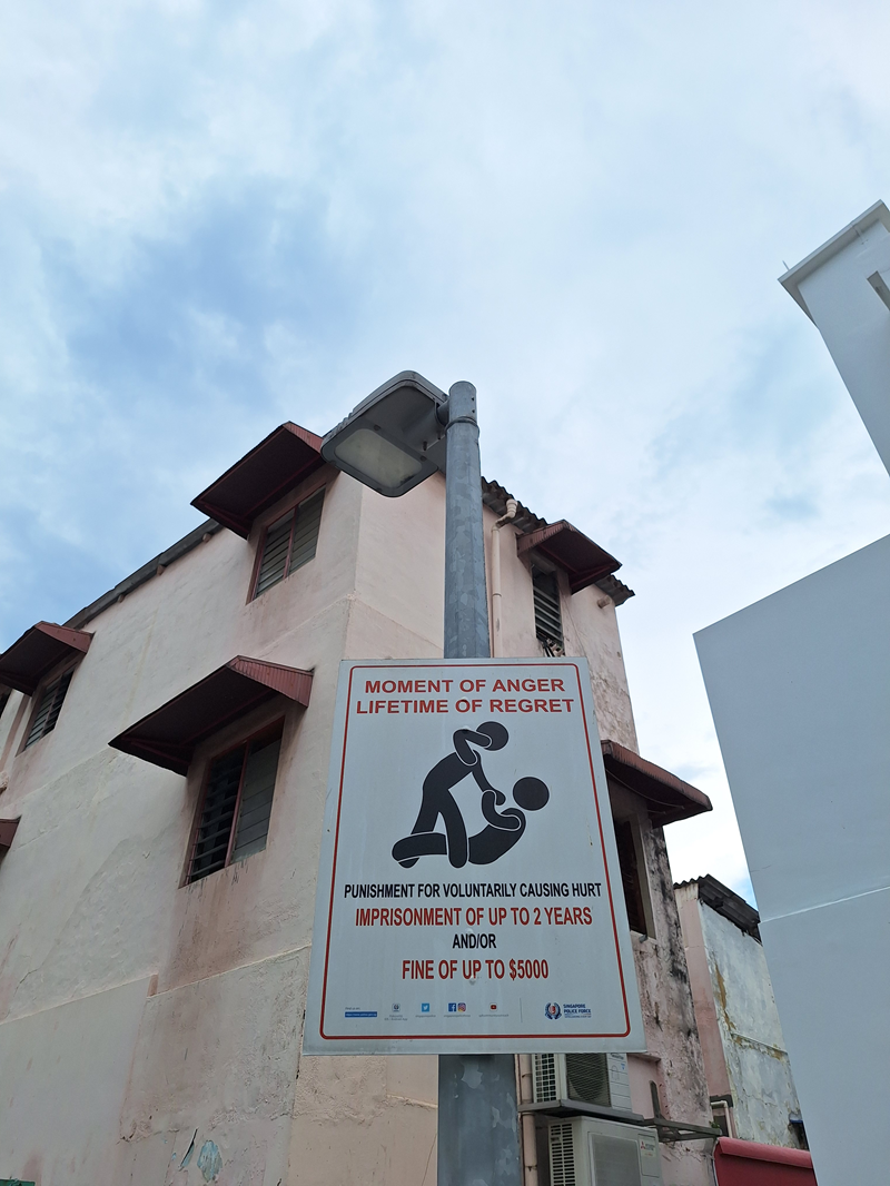 One of many no-fighting signs, which are only found around the Little India area: Yoga Prasetyo